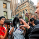 Nicky Jo Dawson, left, confronts public safety Director Wendell Hissrich, right, on the fatal police shooting of an unarmed black teenager, in downtown Pittsburgh on Friday, July 27, 2018. Hissrich was let go by Pittsburgh Mayor Ed Gainey last month, but his termination left the city without anyone with the power to fire police officers.